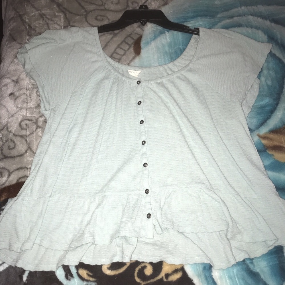 Light blue buttoned blouse